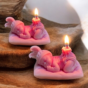 Sleeping baby candle