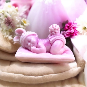 Sleeping baby candle